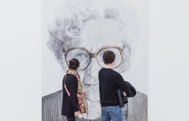 two people in an art gallery